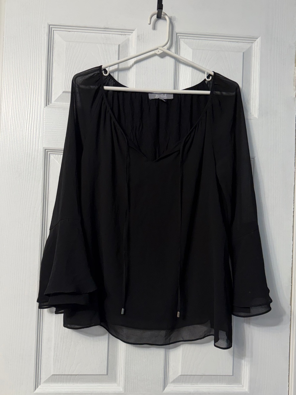 Marled black flowy blouse, long sheer sleeves size small with tie at the necklin